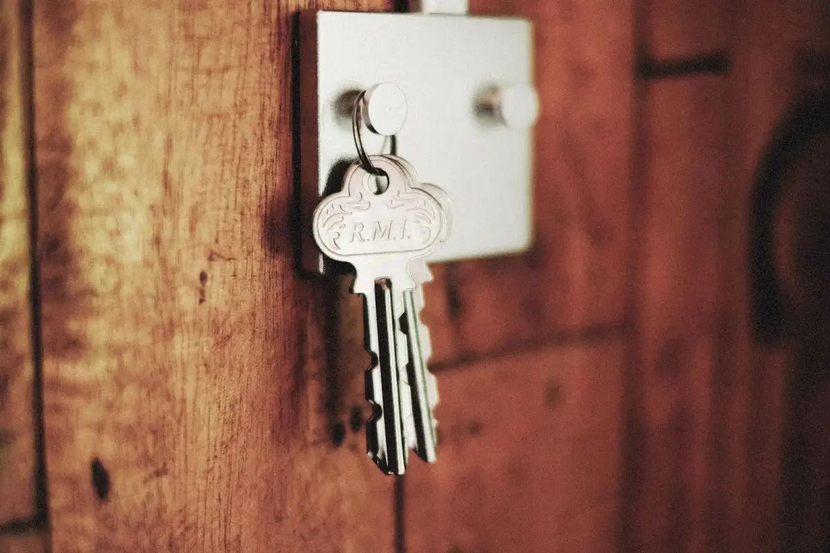 Keys in the lock of a wooden door – call a locksmith Erdington service from Locksmith Birmingham, available 24 hours